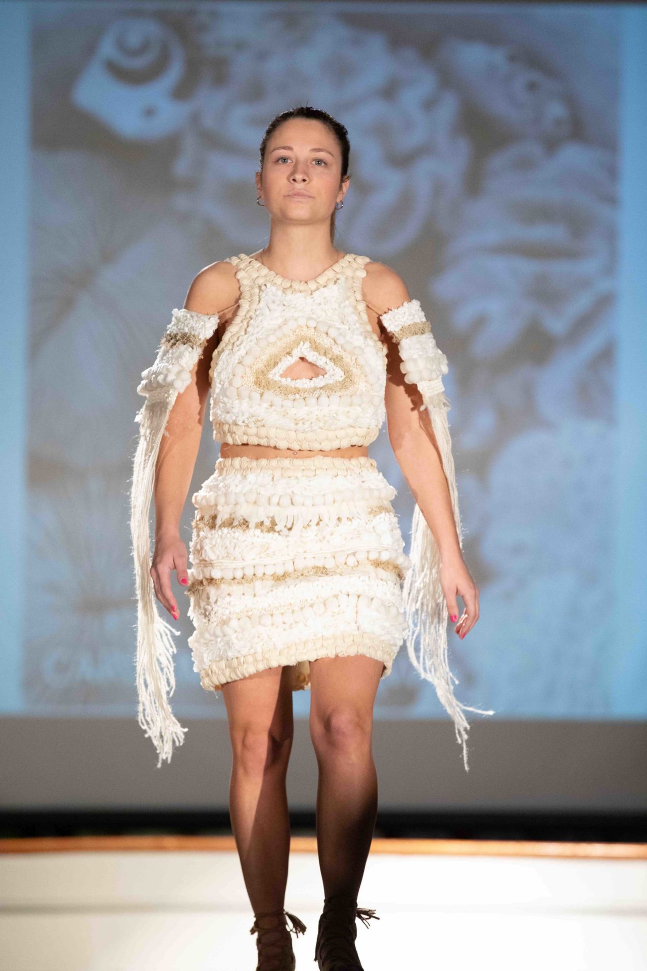 Model walking down runway