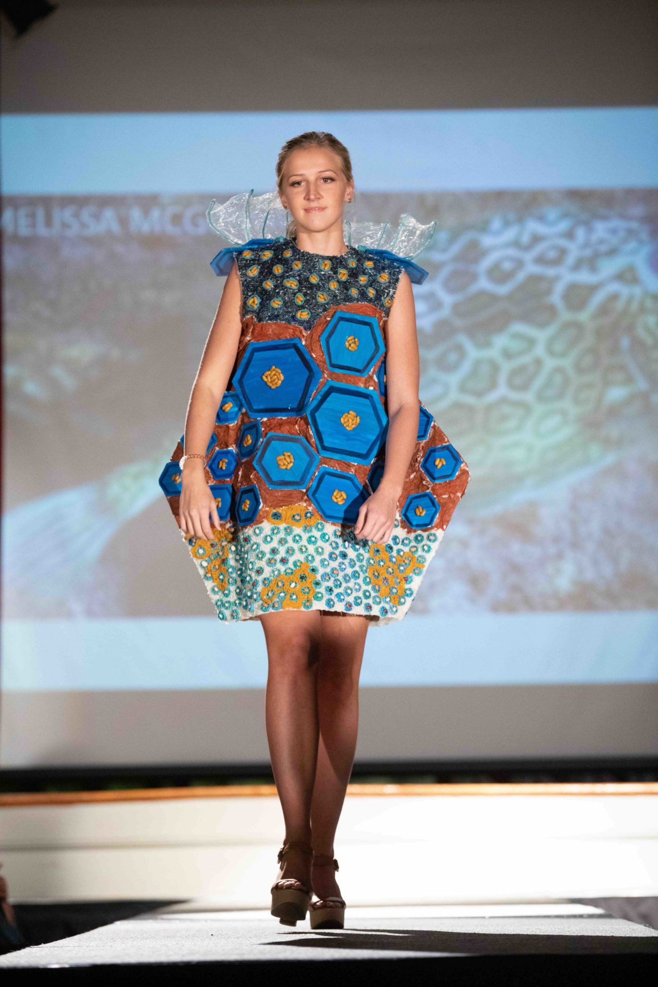 Model walking down runway