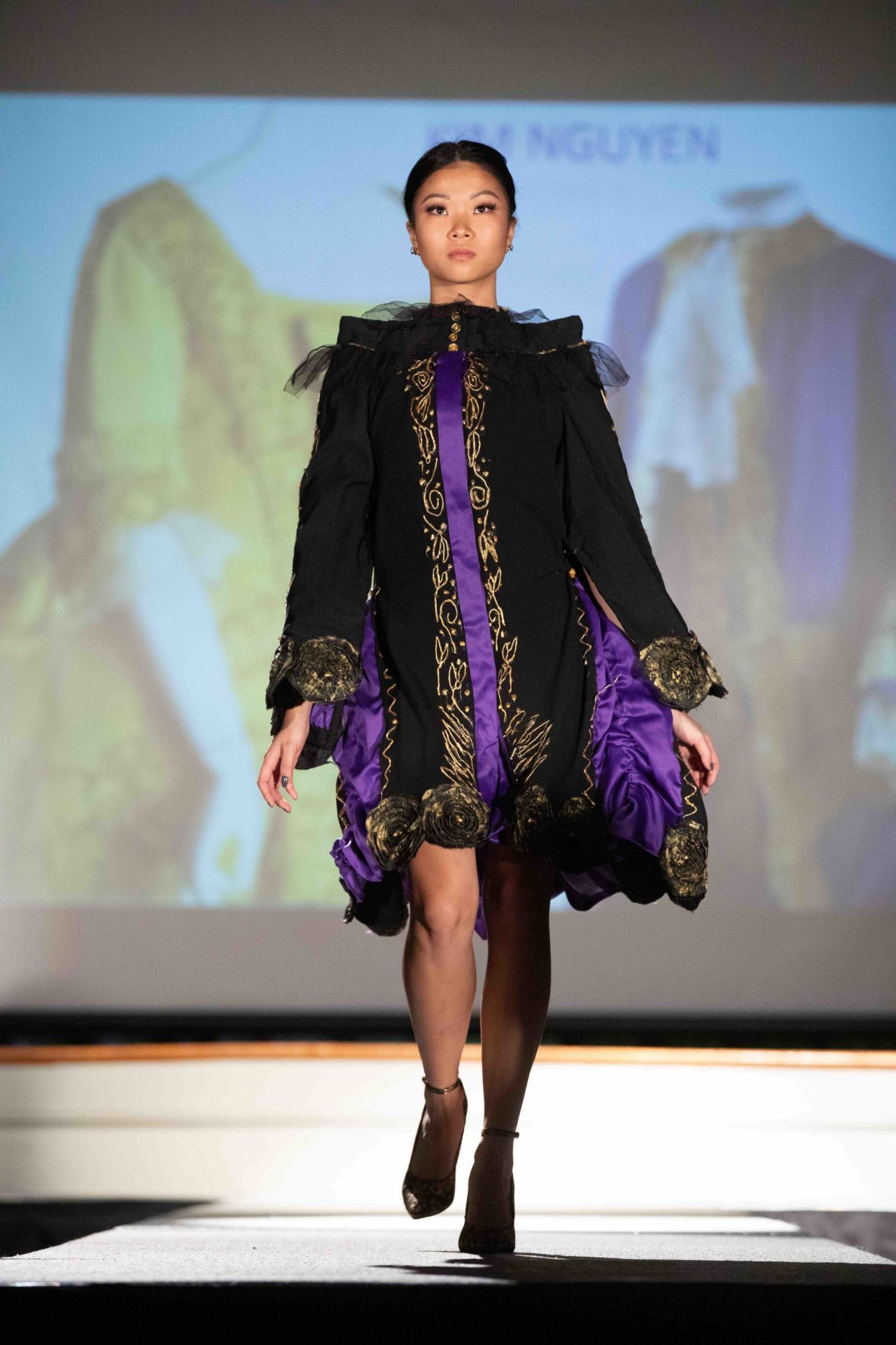 Model walking down runway