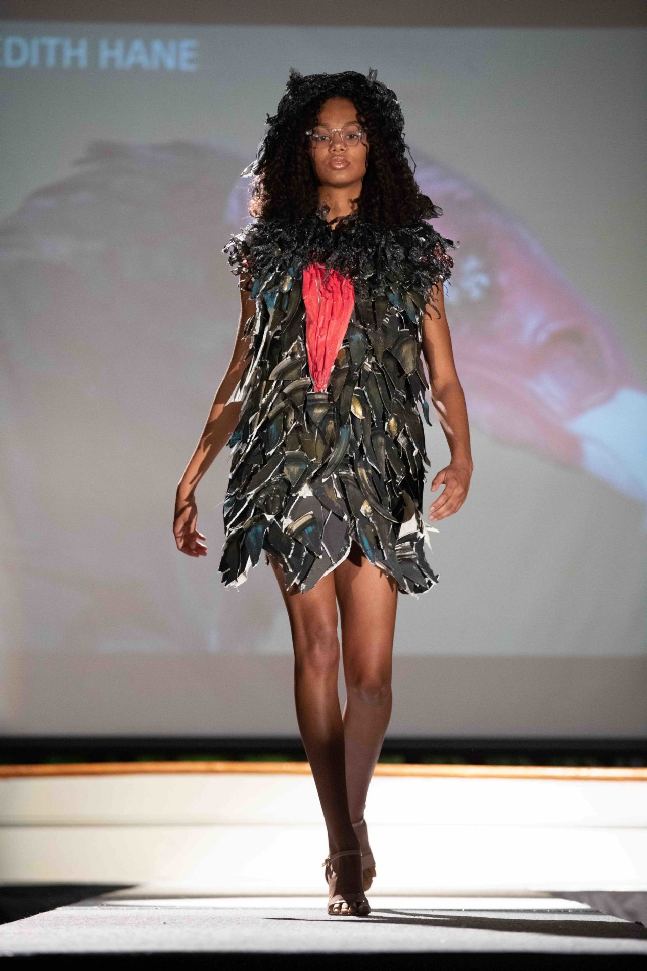 Model walking down runway