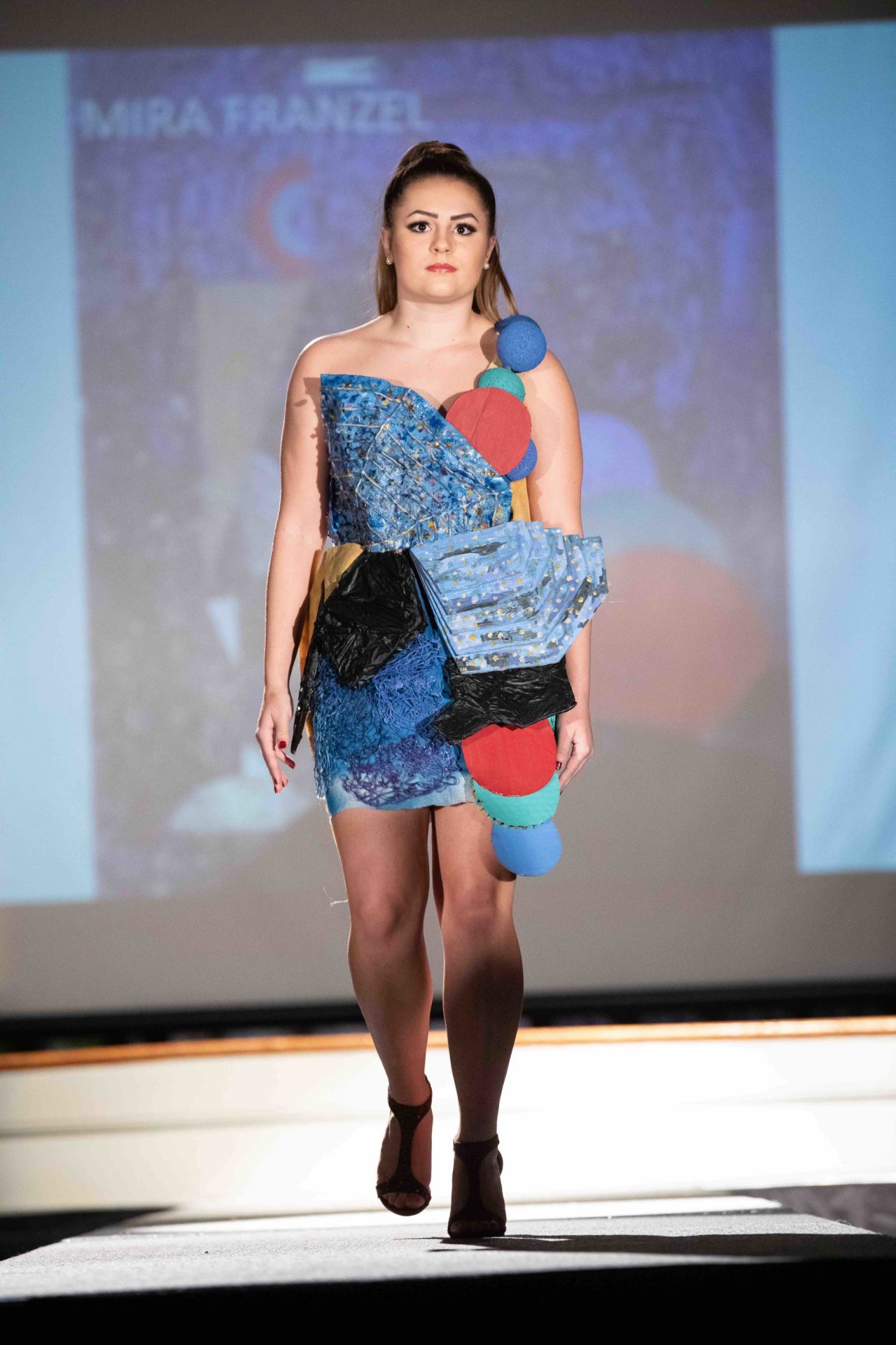 Model walking down runway
