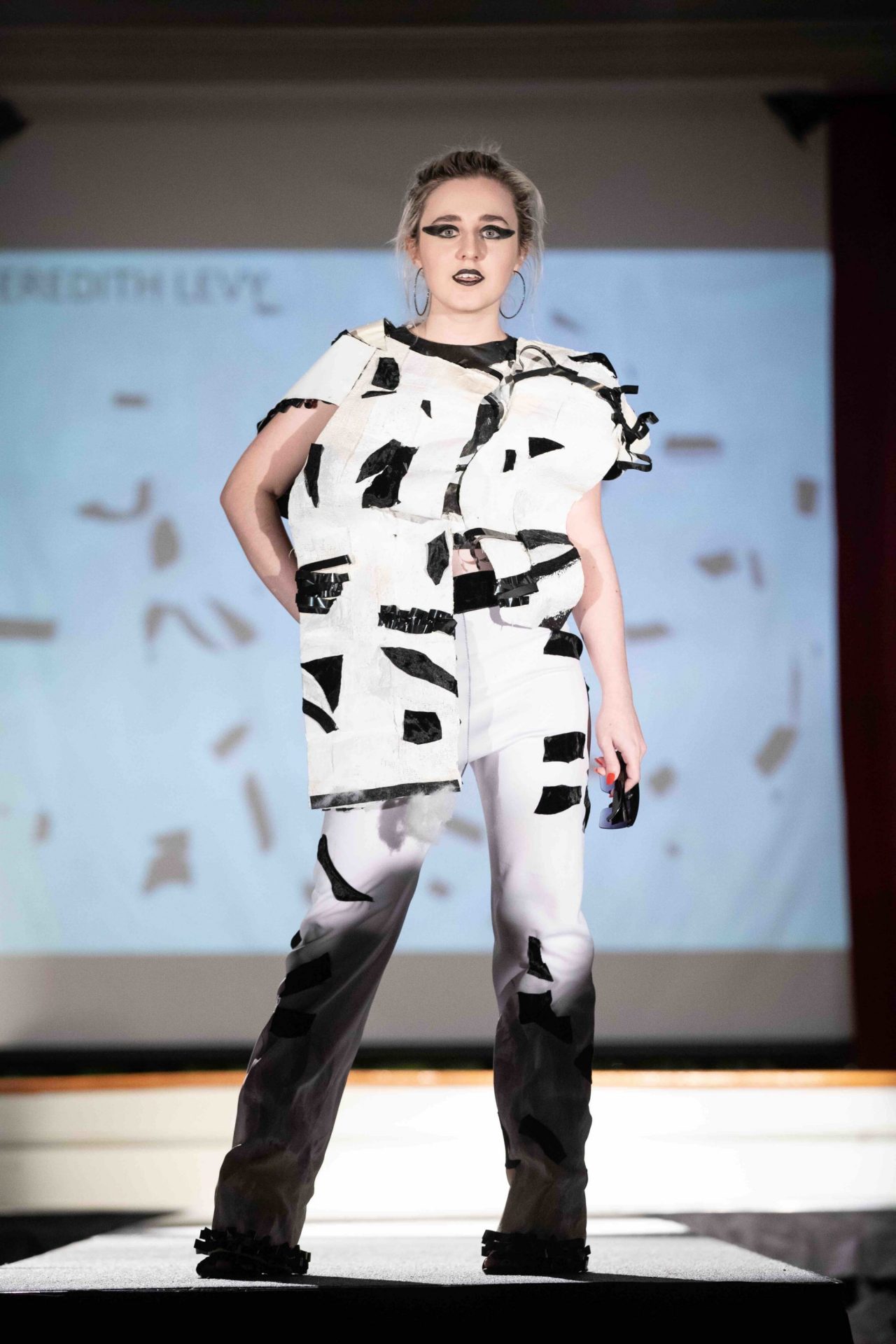 Model walking down runway