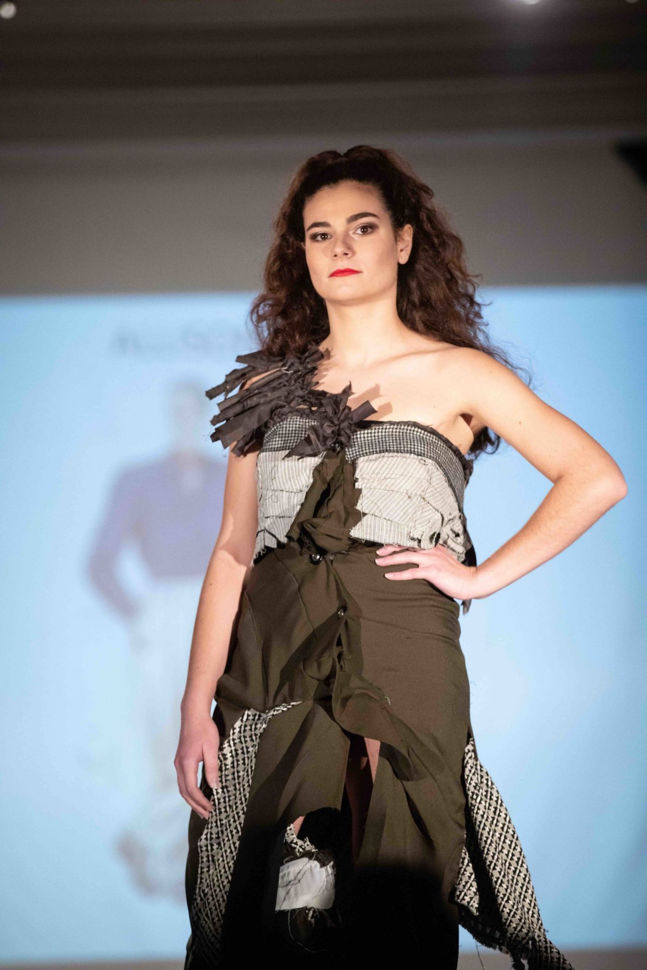 Model walking down runway