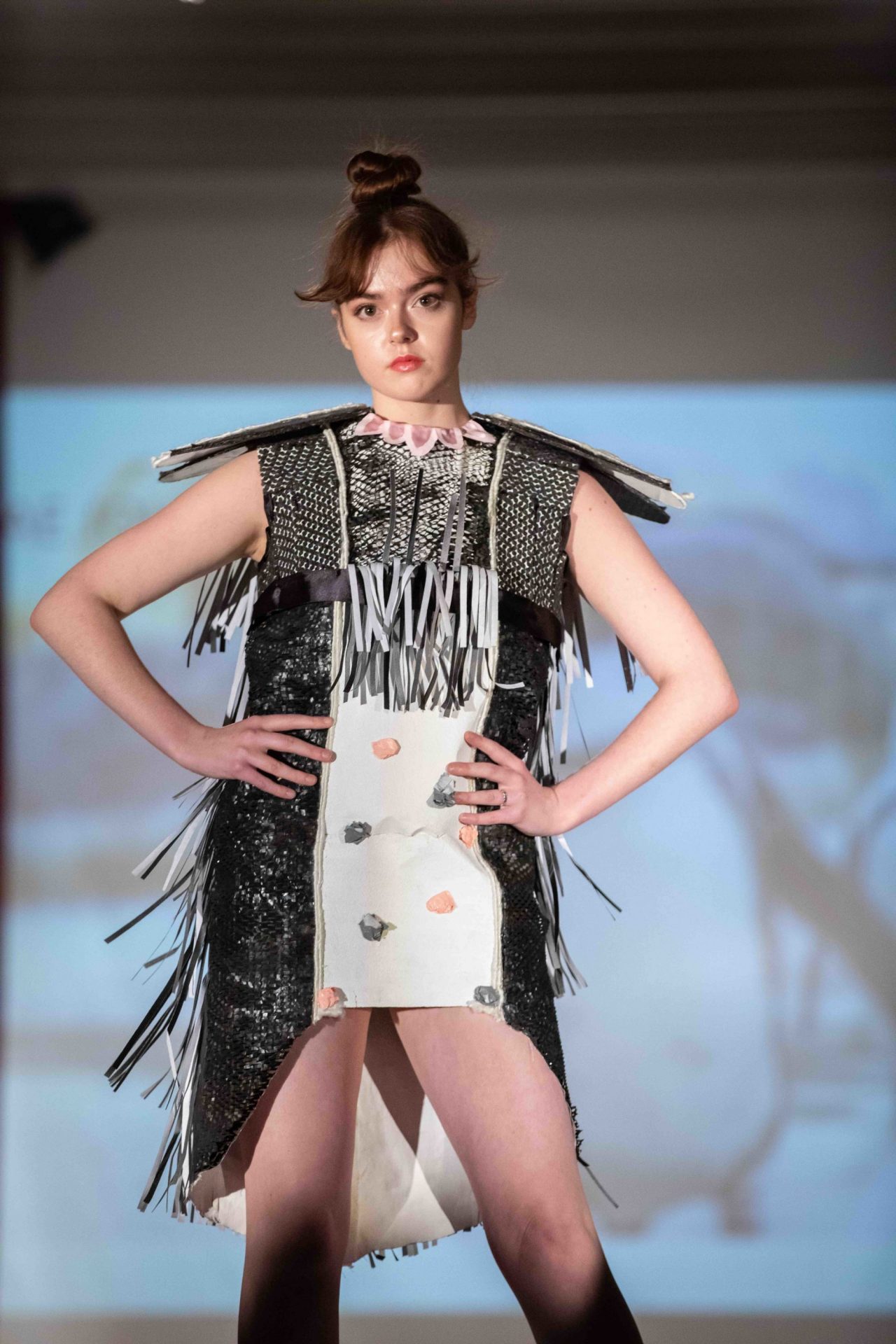 Model walking down runway