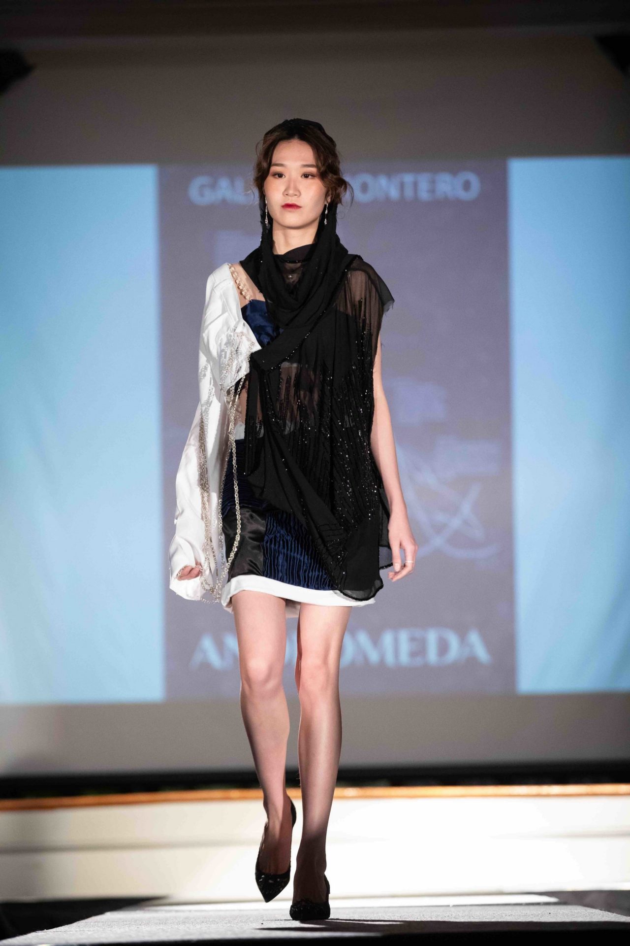 Model walking down runway