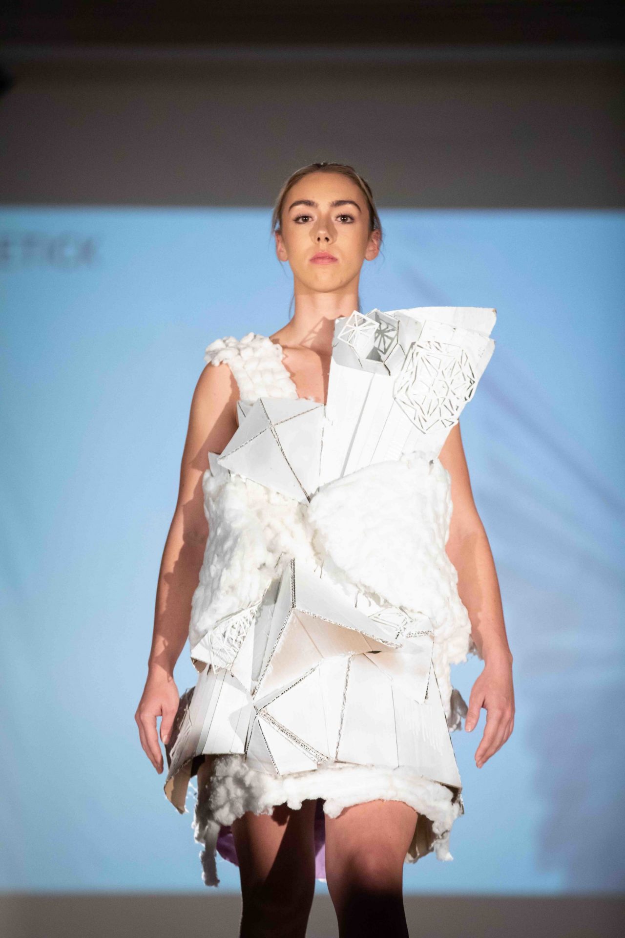 Model walking down runway
