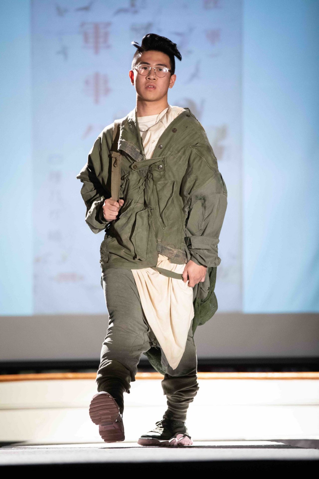 Model walking down runway
