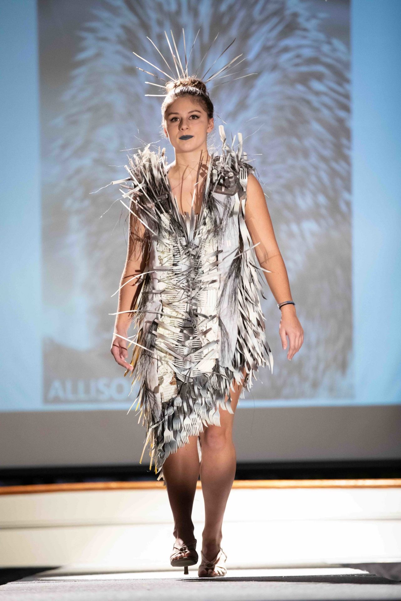 Model walking down runway