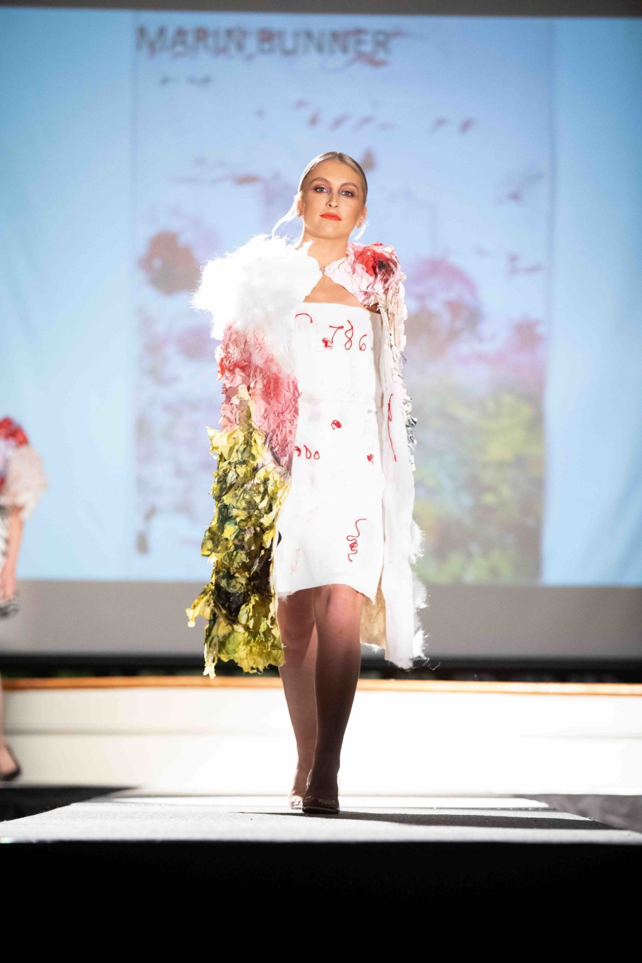 Model walking down the runway