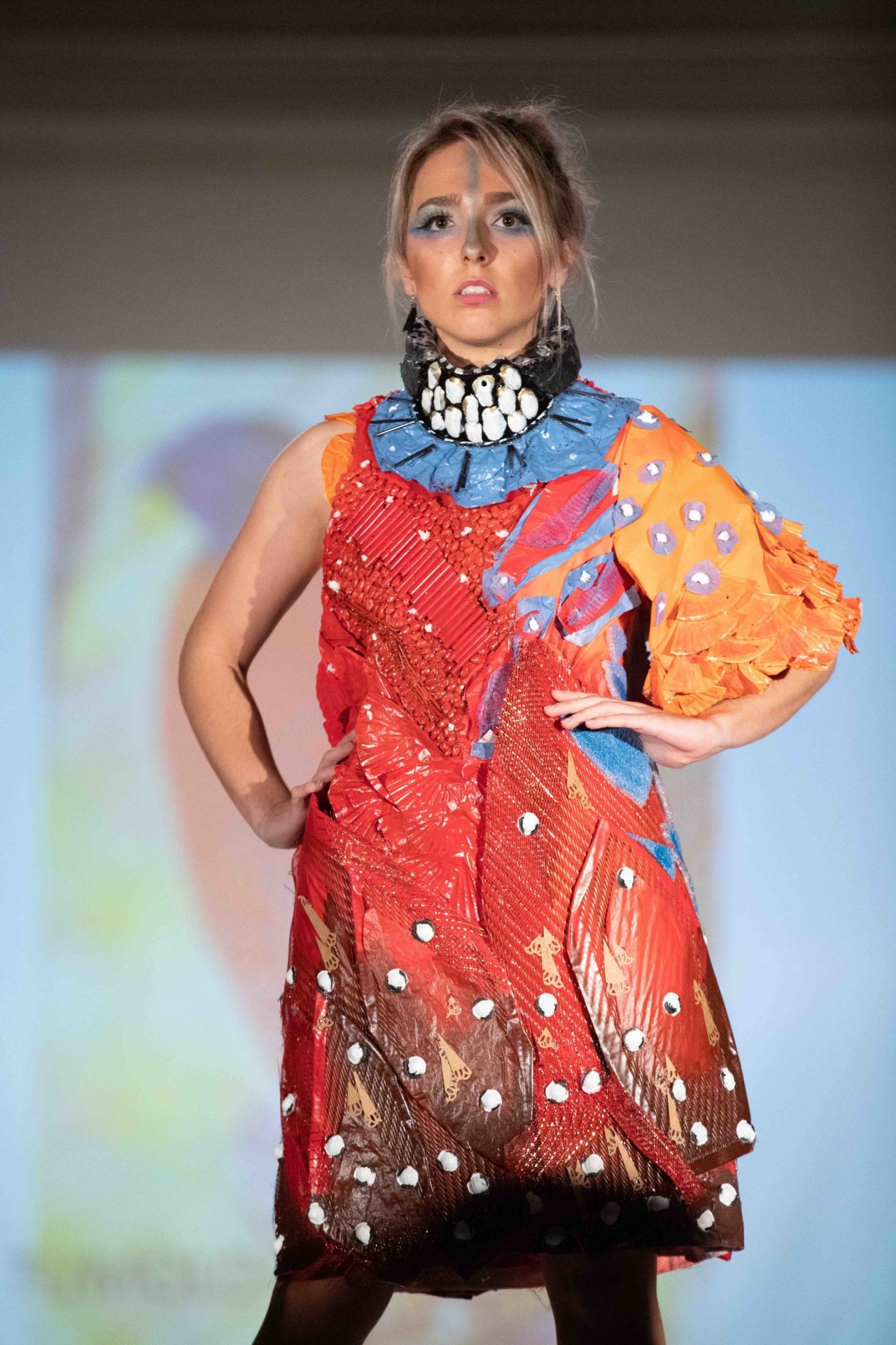 Model walking down runway
