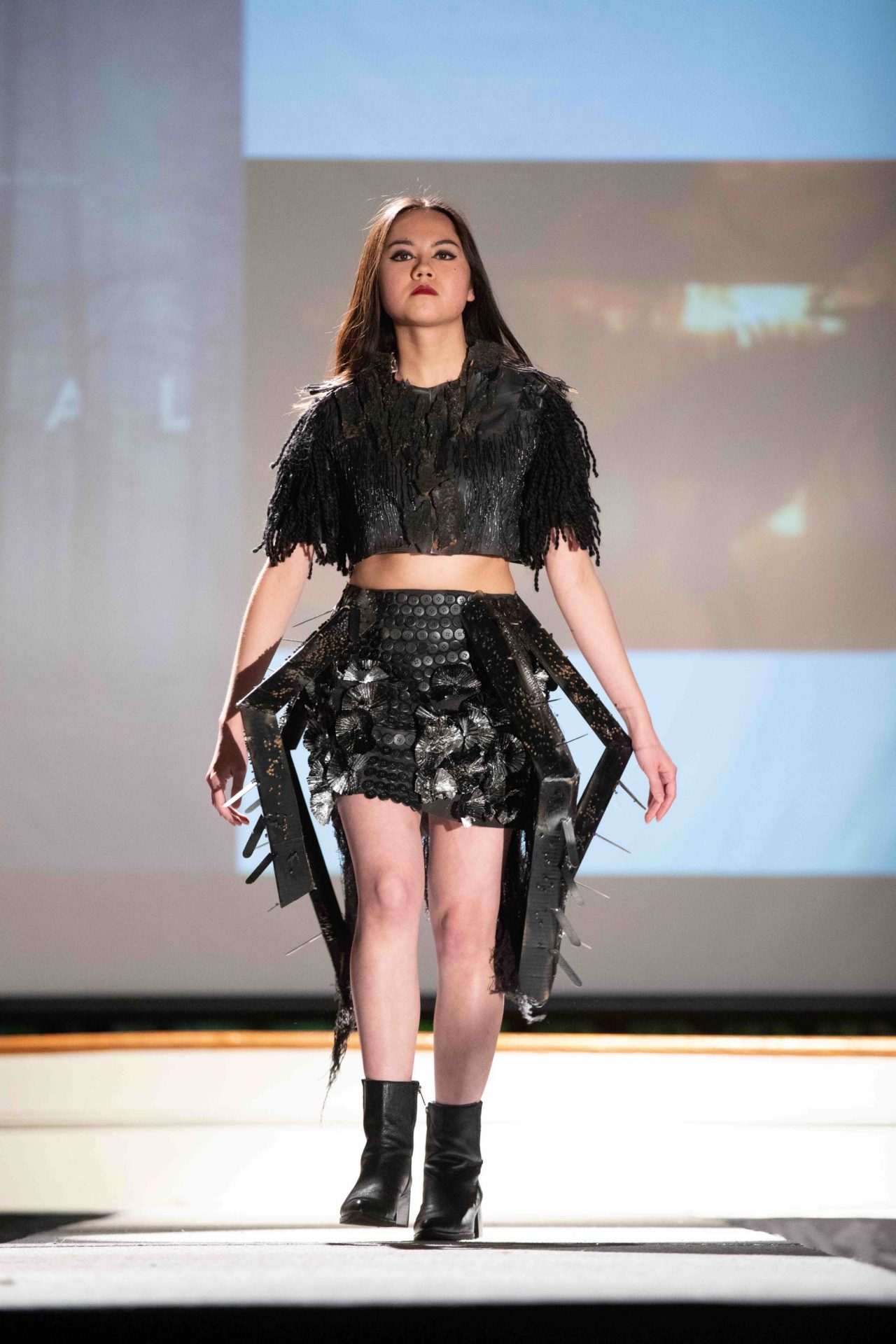 Model walking down runway