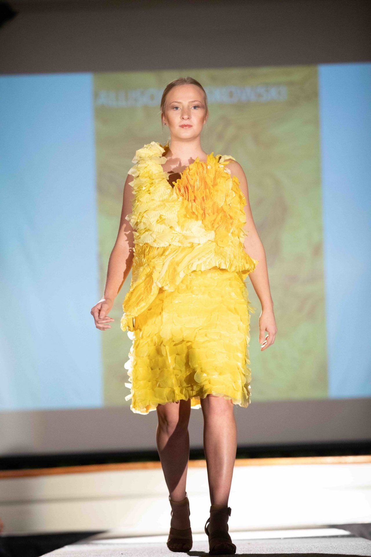 Model walking down runway