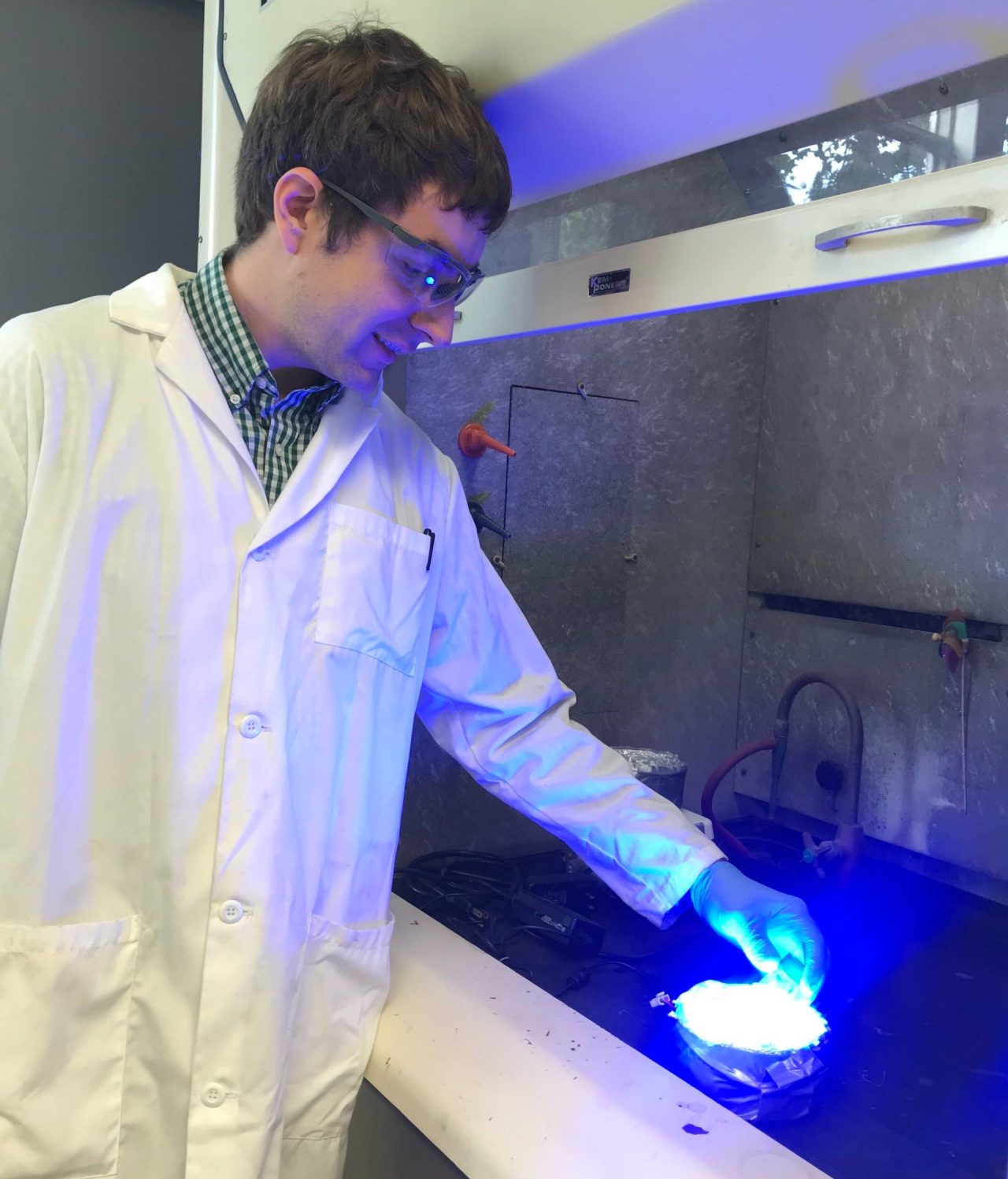 Dr. Milligan uses blue light