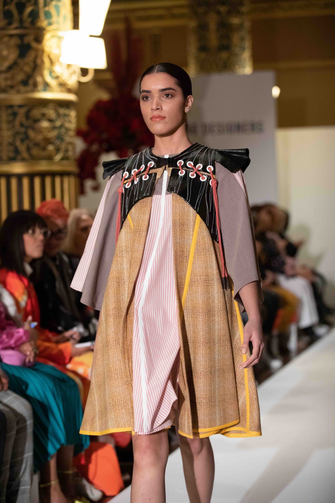 Model walks down the runway at NYFW