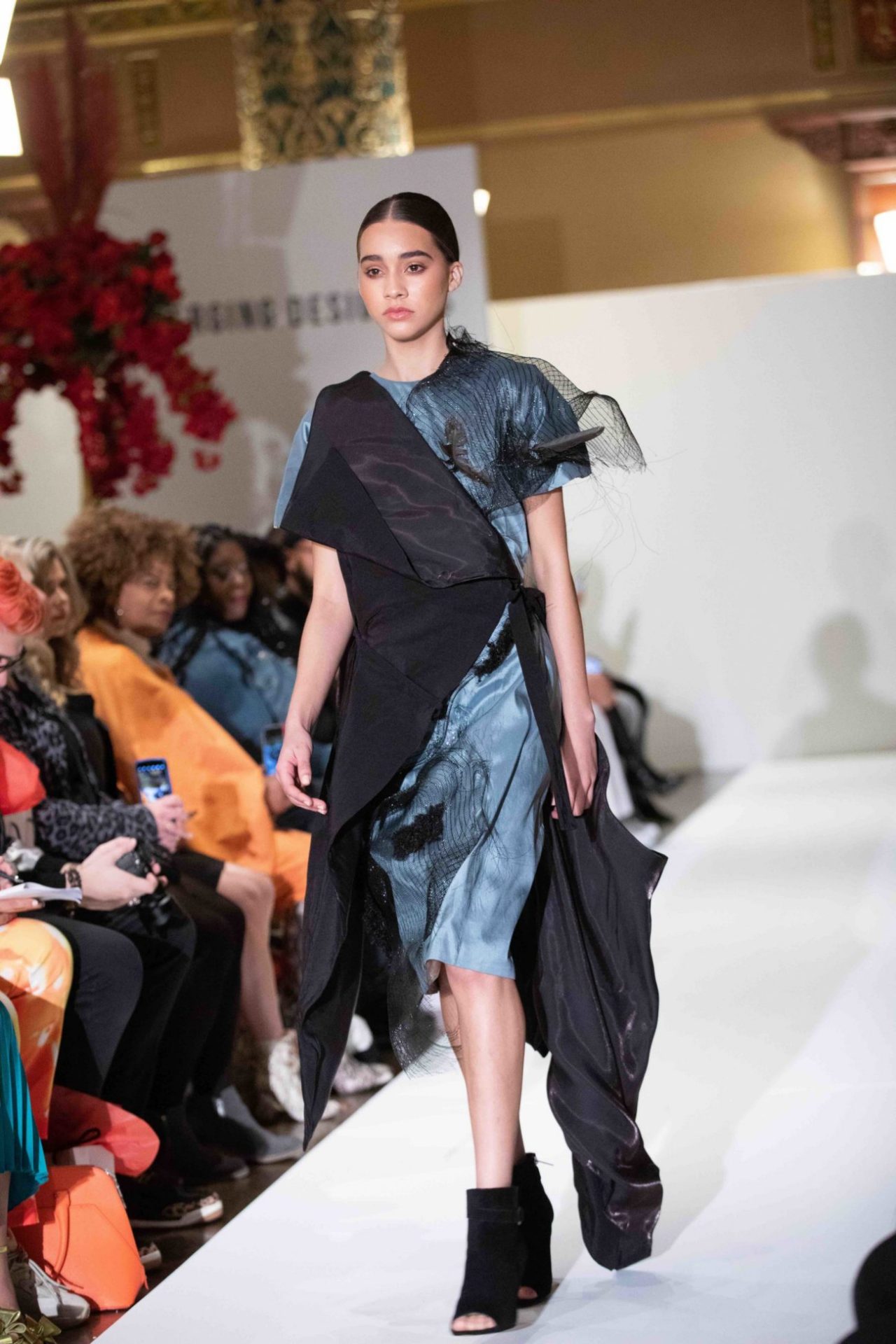 Model walks down the runway at NYFW