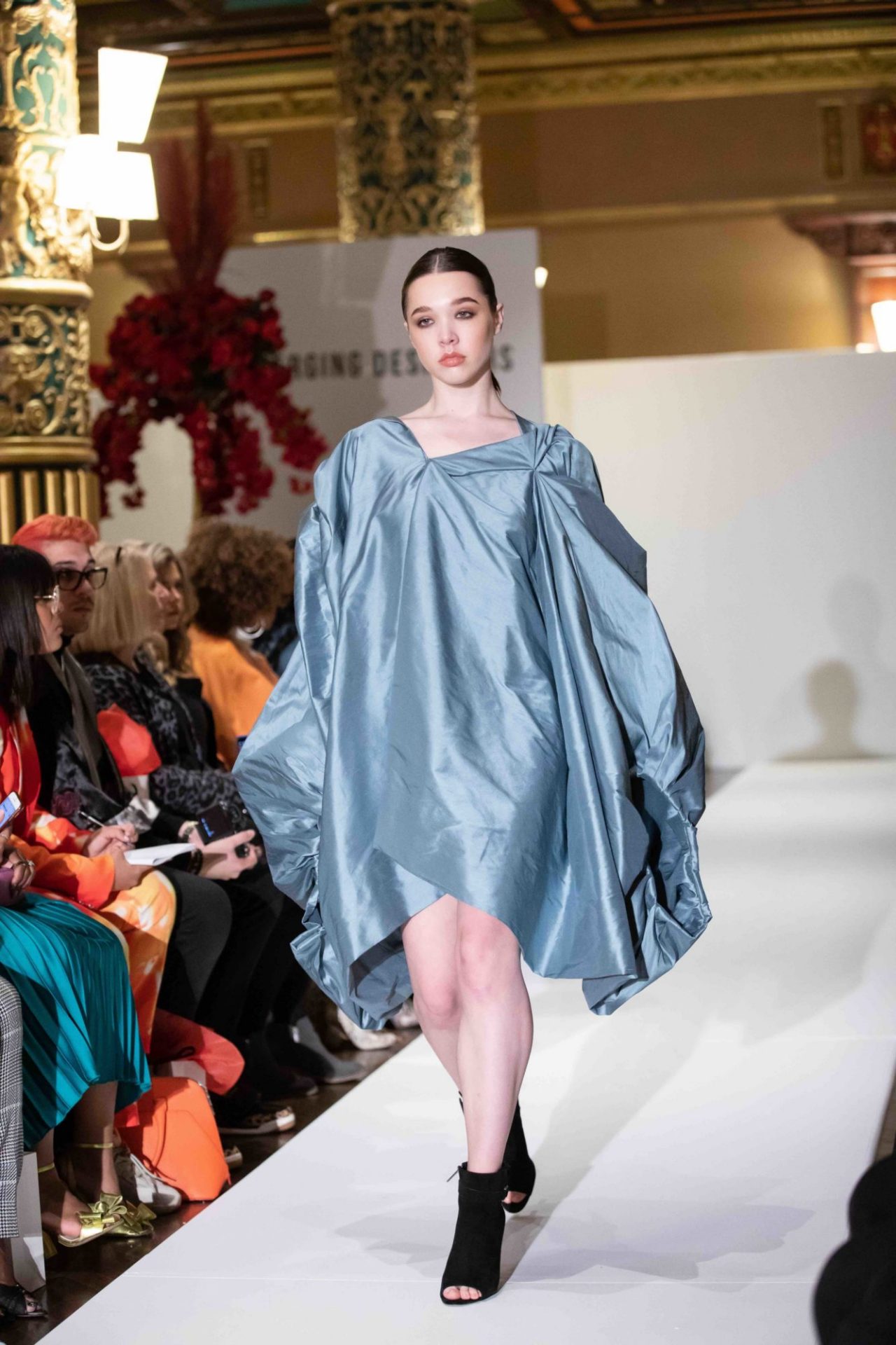 Model walks down the runway at NYFW