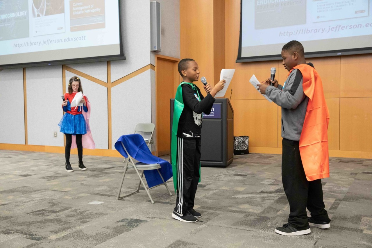 Kids acting out a play