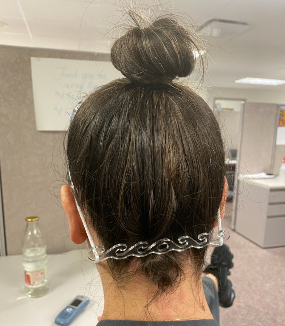 View of the ear savers behind a person's head