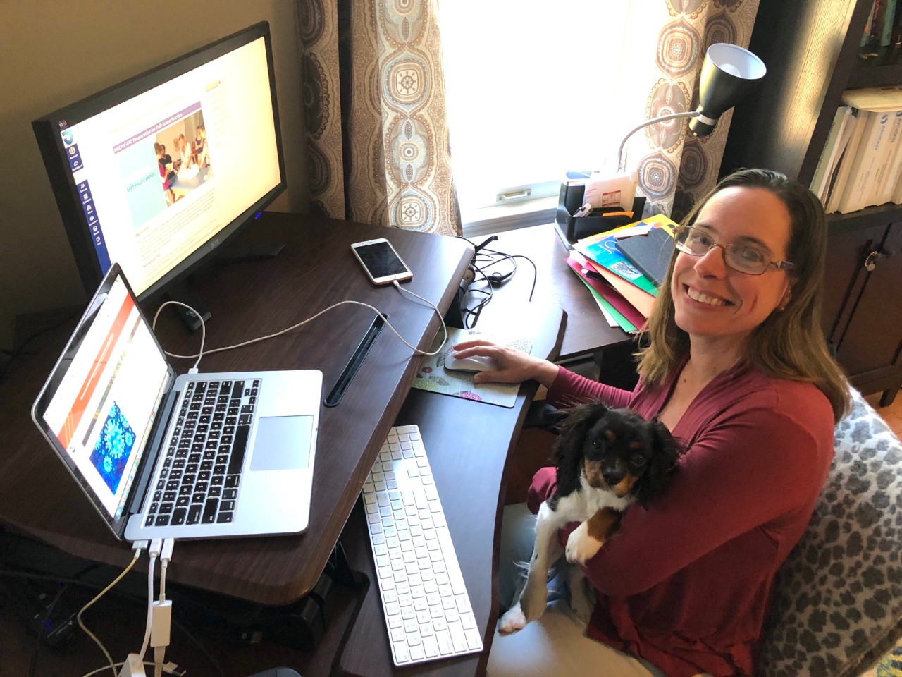 Midwifery faculty member at her computer