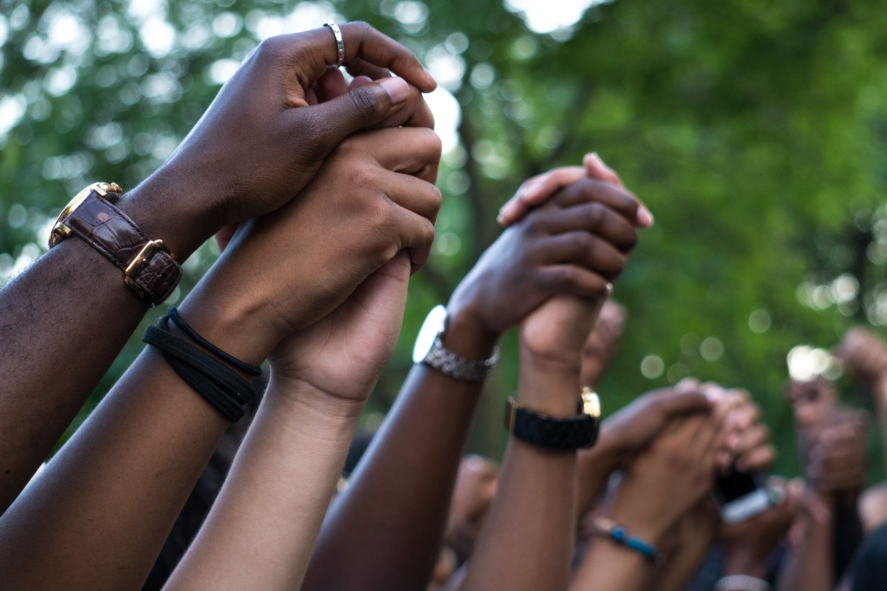 hands in protest against policy brutality