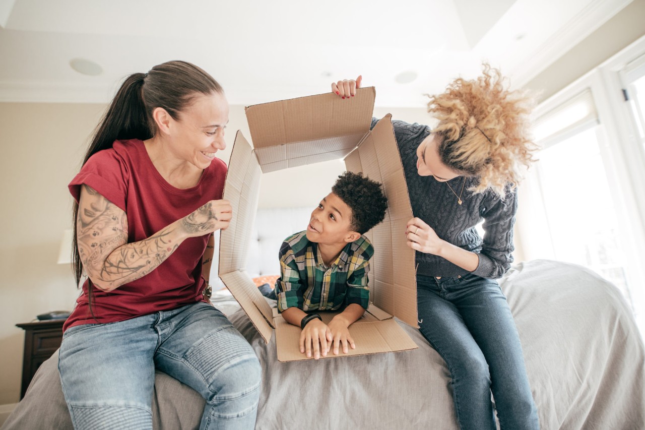 Couple creating an Obstacle Course for son
