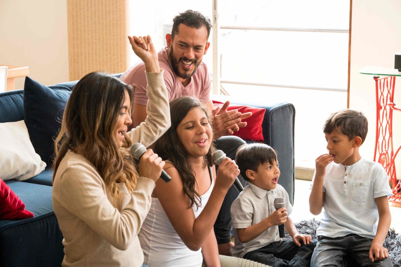 Family singing Karoke