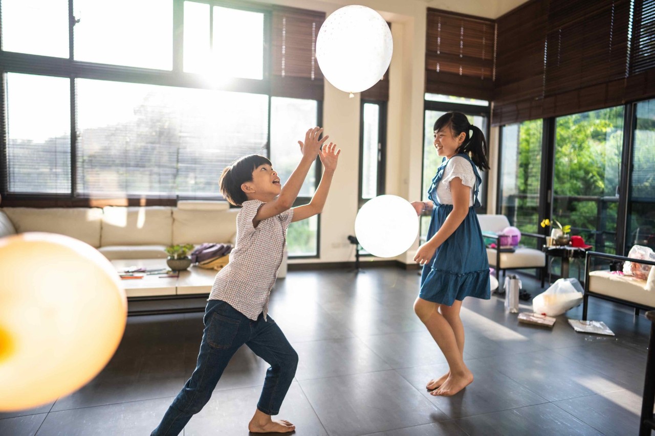 Kids playing with vollyball