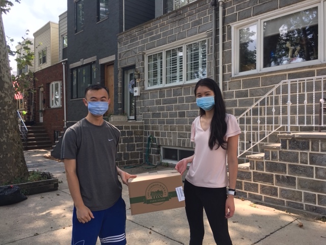 Student volunteers Jeffrey Mu and Amber Zhang