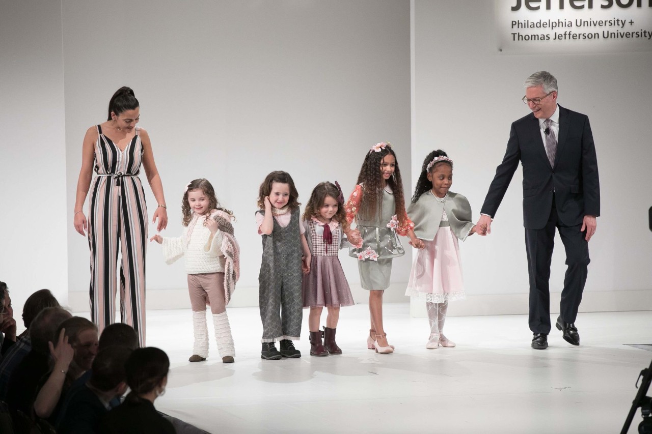 Children models walking on stage