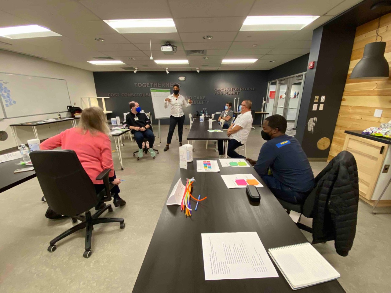Kyra working with colleagues