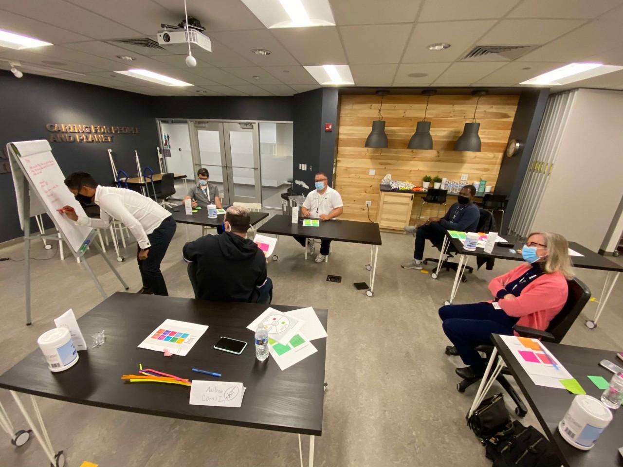 Kyra working with colleagues