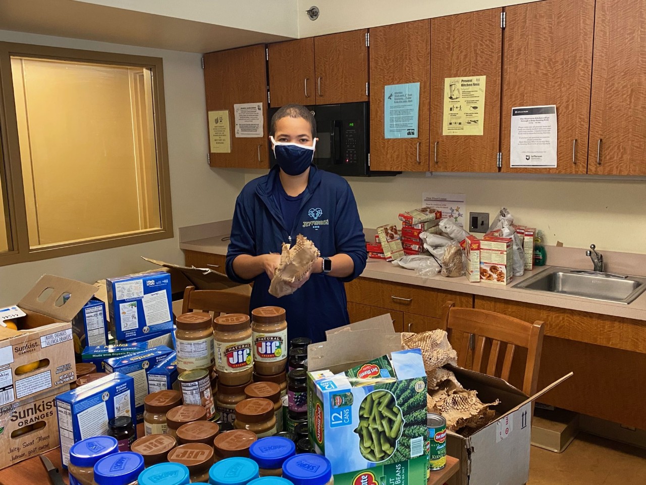 Student making care packages for Ramily Market