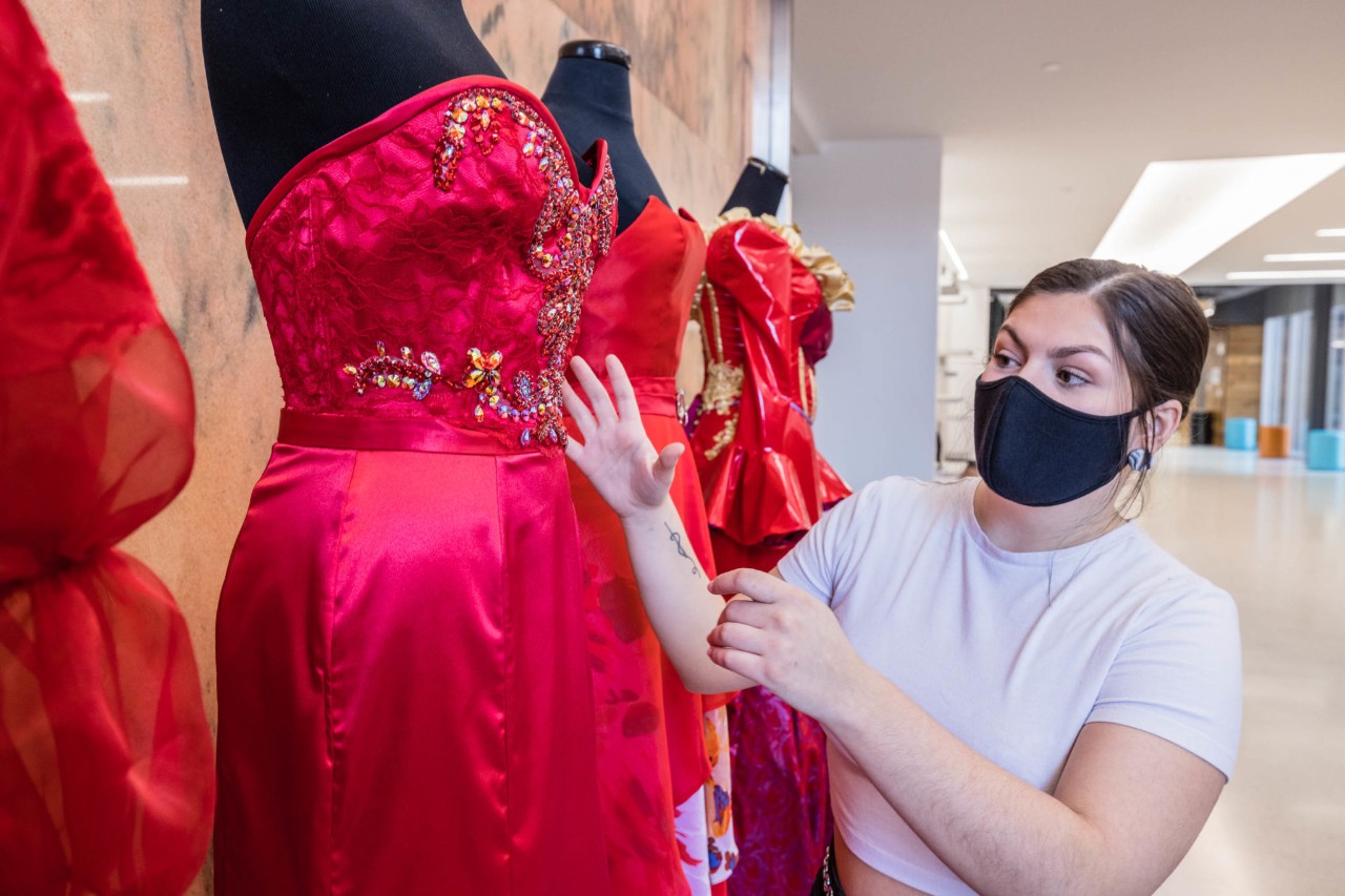 Student Juliana Gober with her red dress