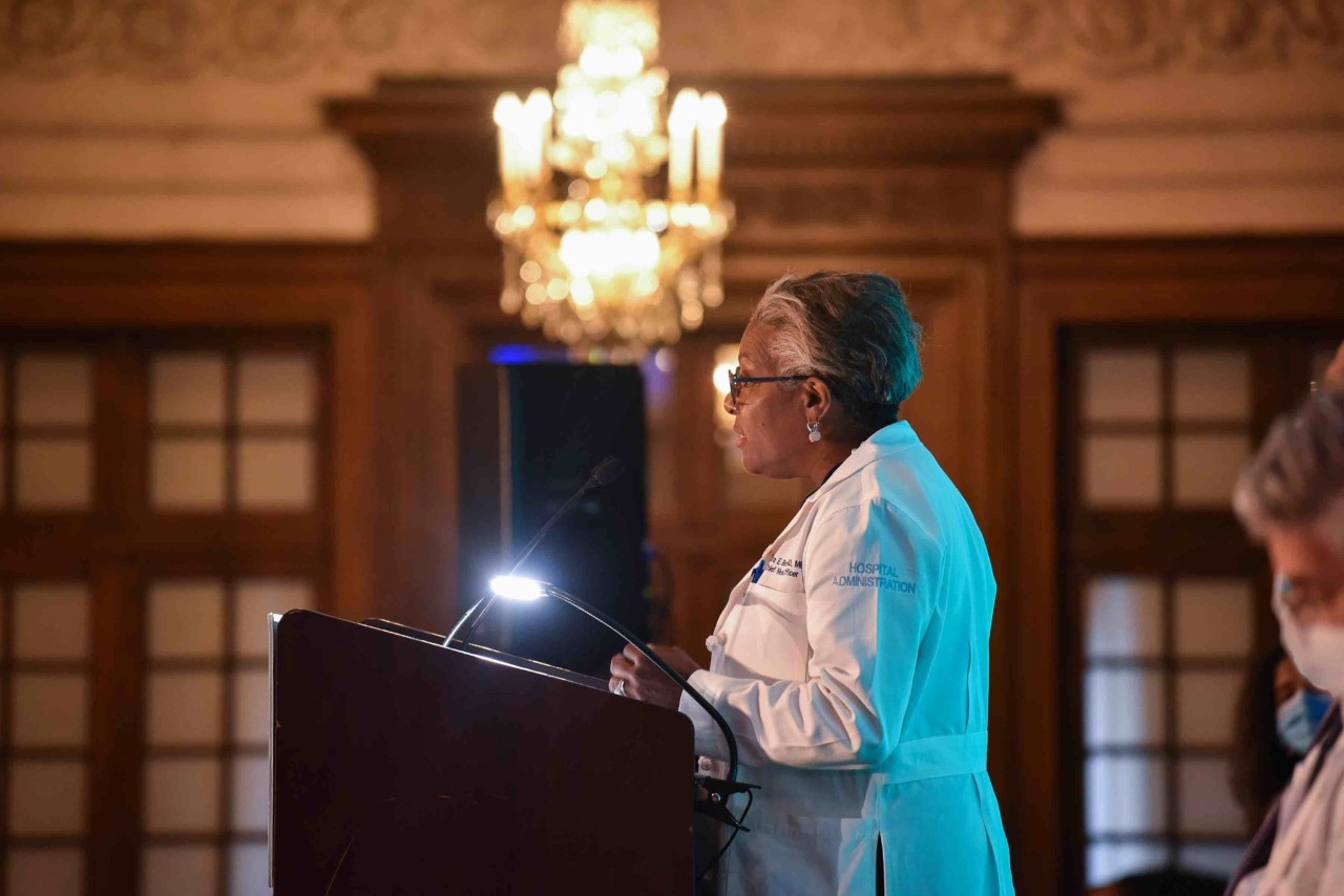 Dr. Brookes at the podium