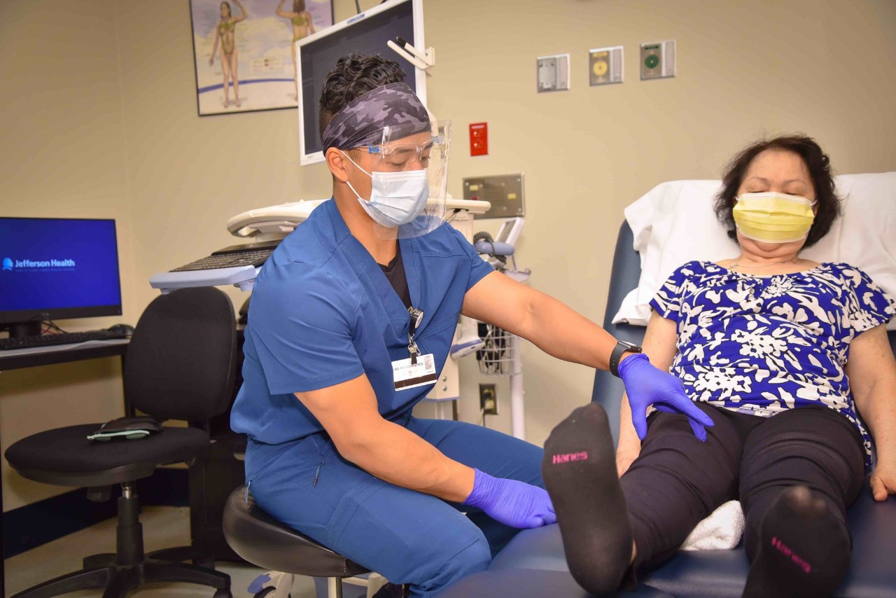 PT student works with a patient.