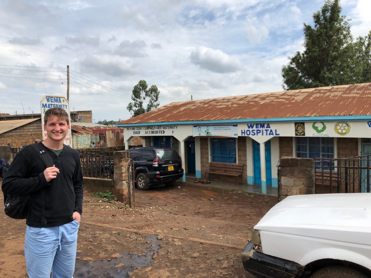 Michele Ganz standing in front of a clinic