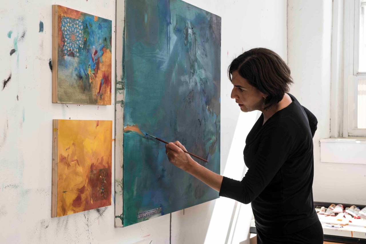 Dr. Moghbeli working on her art