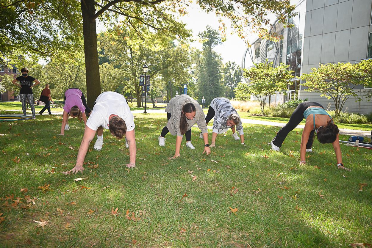 Students doing crabwalk