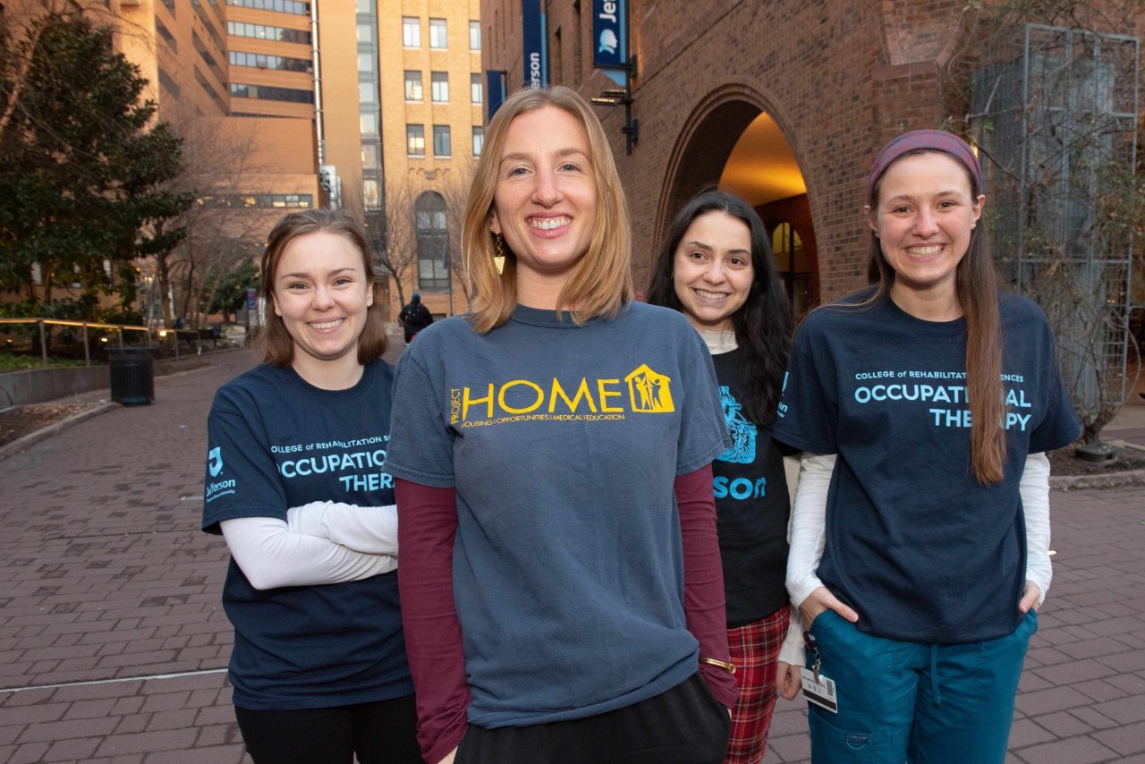 Occupational therapy students part of the Project Home Team standing outside.
