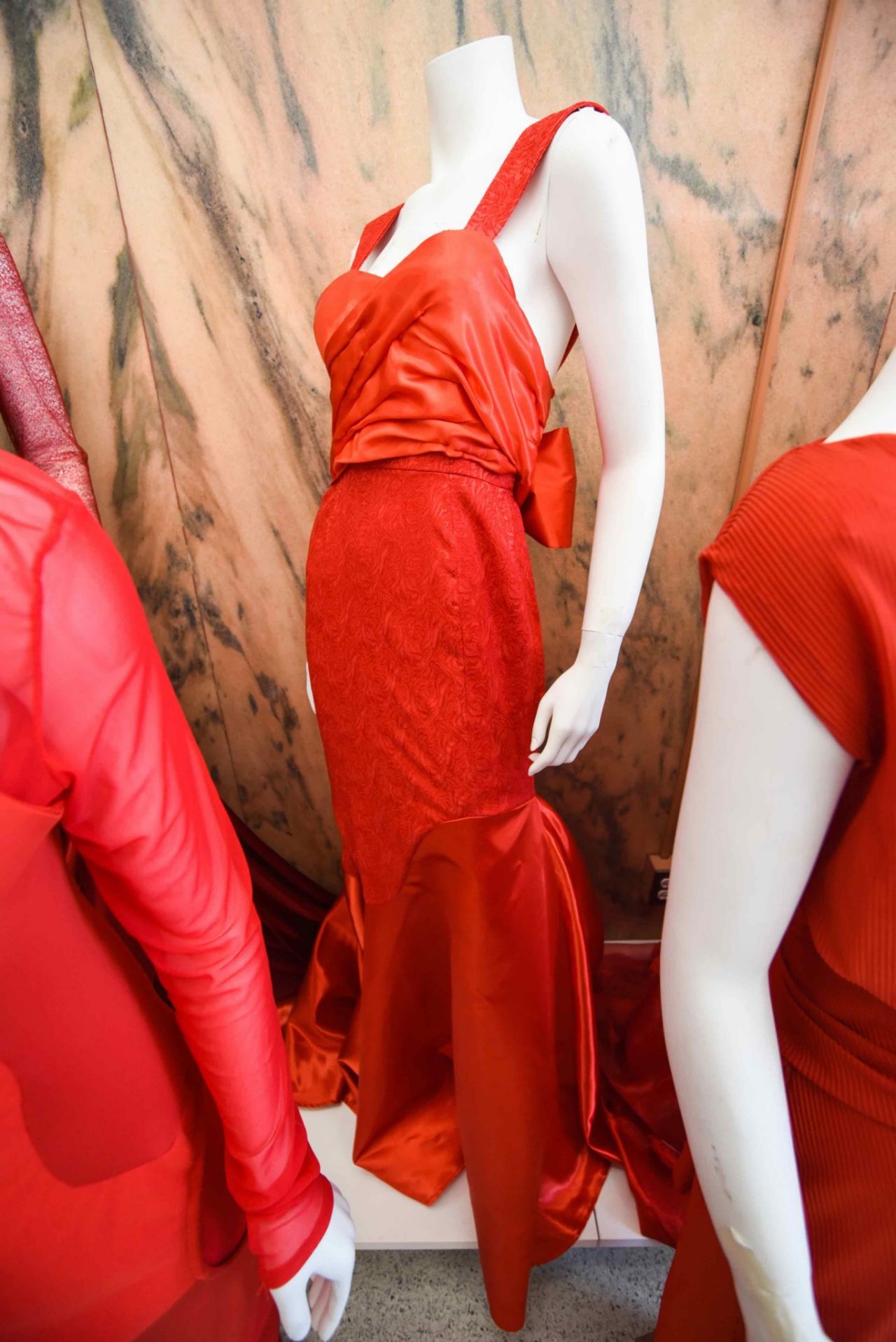 Hailey Nicchi, “Golden Age” “Golden Age” is a fall/winter gown designed for women ages 30-45. It encapsulates the essence of confidence, glamour and power that women portrayed in cinema in the 1940s and ’50s. The overall concept looks at women’s influence during this era and how designer gowns were utilized in film to make a statement. Elements reminiscent of this era, such as charmeuse satin and damask jacquard, were incorporated, and the silhouette takes inspiration from fashion of that time. This gown is for women who want to feel confident and influential in what they wear, giving them the feeling of a movie star during the glamorous Golden Age of Hollywood.