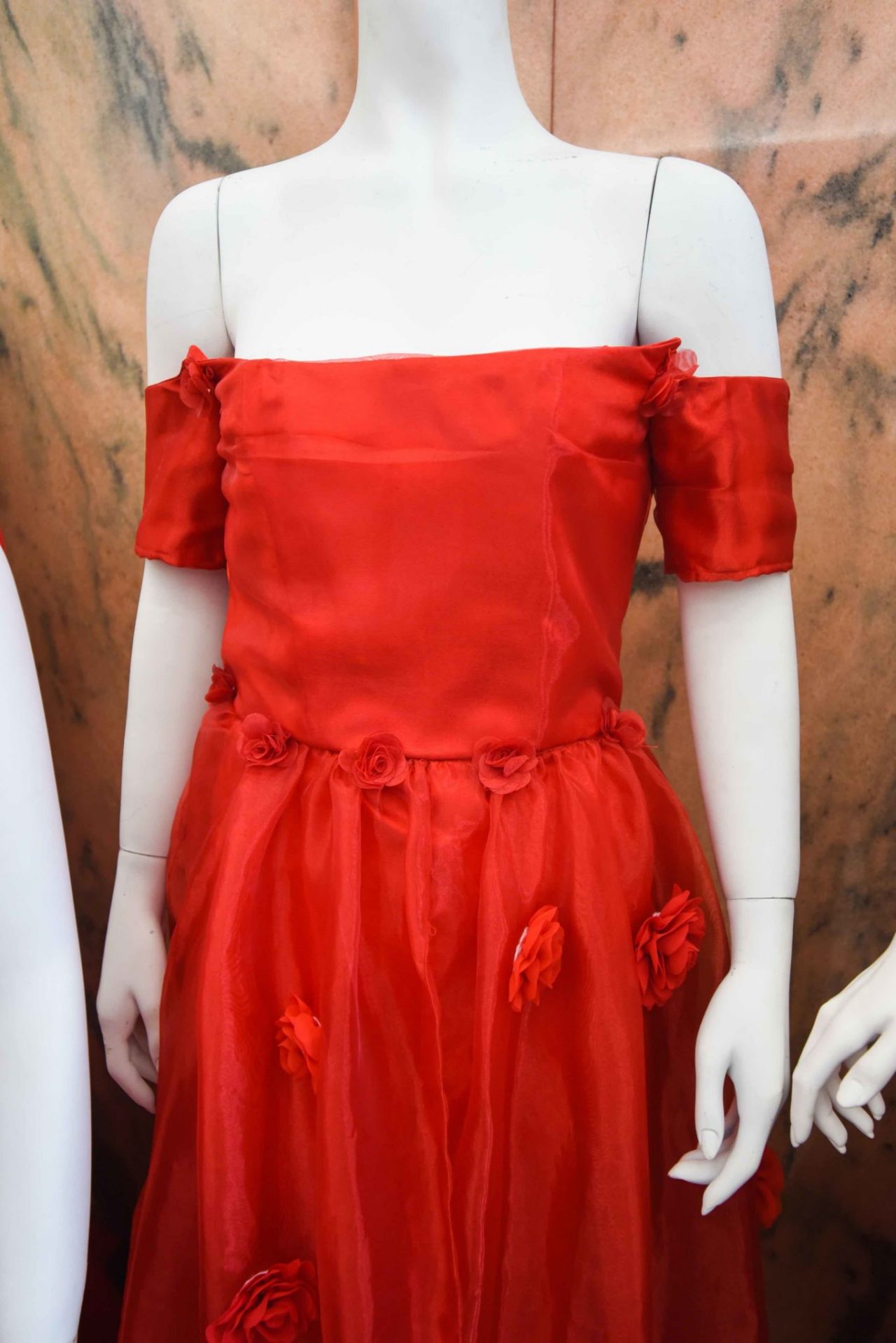 Gabrielle Ramos, “For Linda” My dress takes inspiration from red roses and my grandmother who passed away. Whenever my family or I smell red roses, we know she is around. I also took inspiration from her wedding gown, which was supposed to be passed down to me. I felt that designing a dress that can showcase my favorite parts of her wedding gown would make the dress a bit more personal. By adding the red roses, I am paying homage to my grandmother. She was a special person in my family and creating something for her honors her memory.