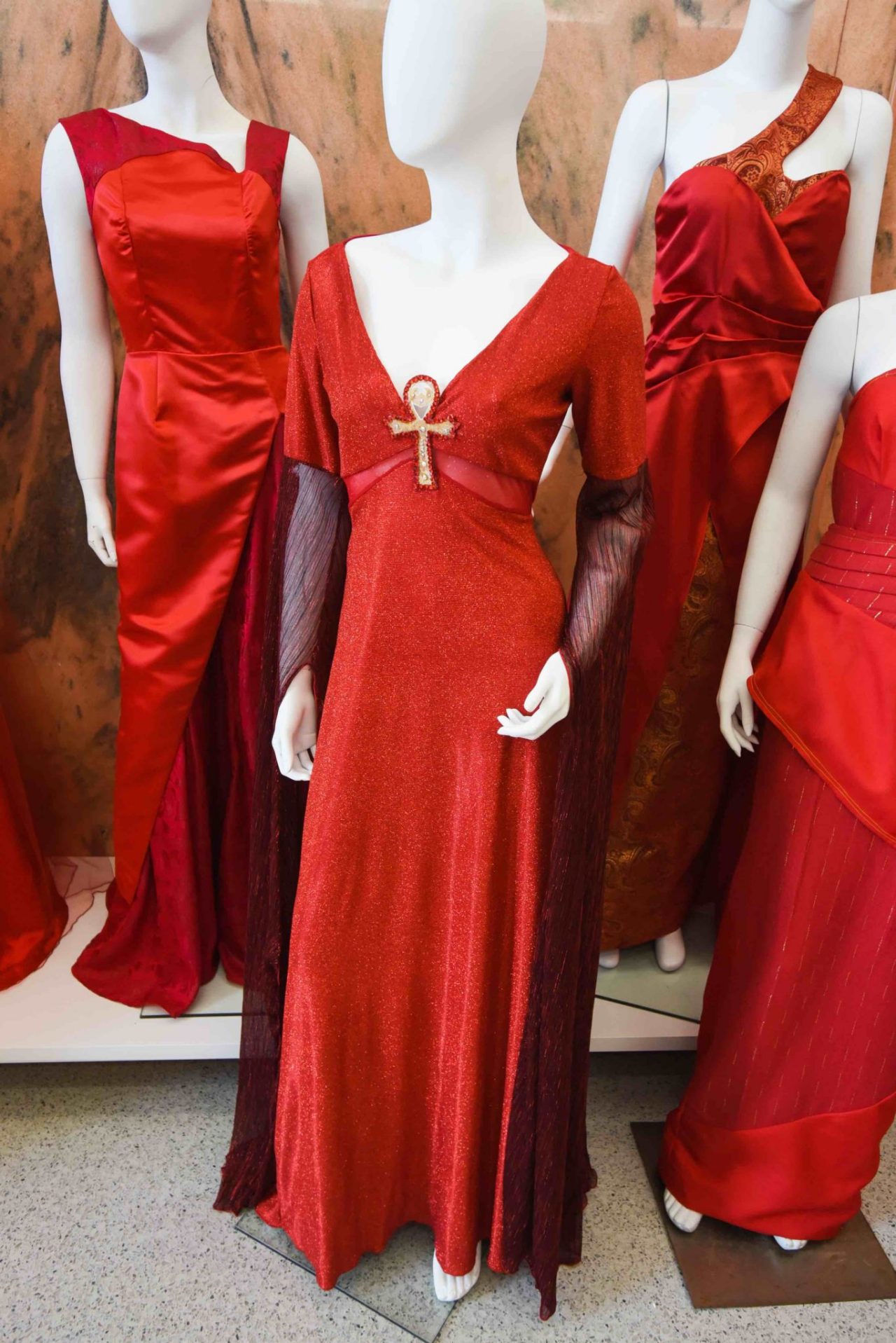 Kierra Lee, “Aset” This fall/winter gown is inspired by Isis, the Egyptian goddess of health, marriage, fertility, magic and the moon. Fabrics such as silks, jacquard wovens and velvets are explored to convey the essential goddess appeal throughout the dress. Isis was a powerful healer and a sign of hope for the Egyptians, even through their darkest times. This is a pivotal aspect of the story, which is highlighted in the final dress design.