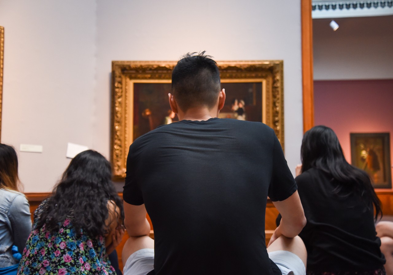 Med students looking at artwork