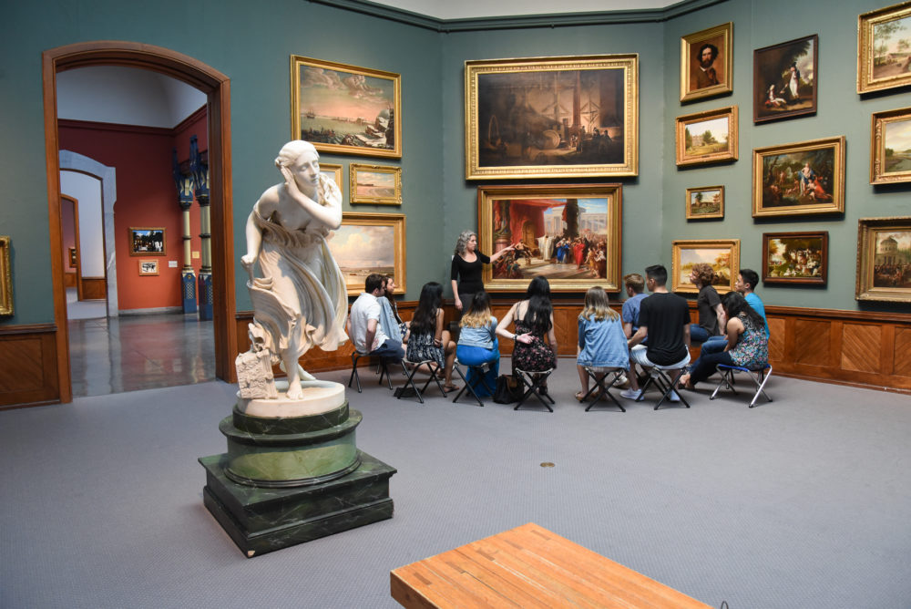 Medical Students looking at artwork