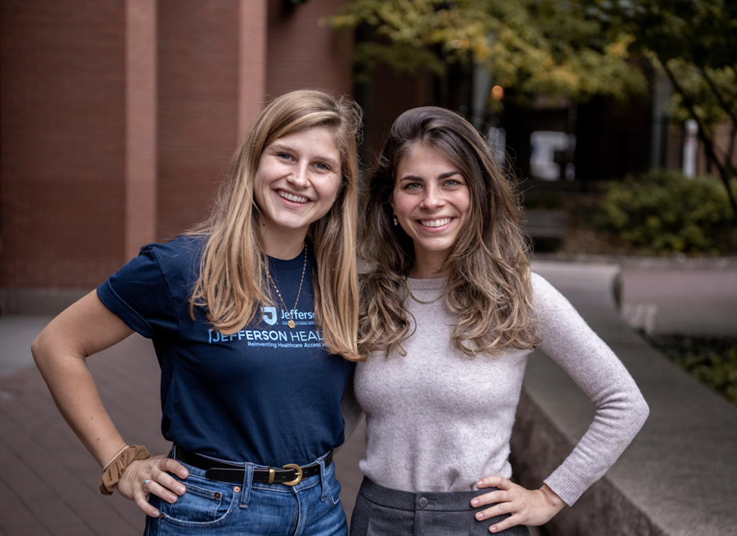 Lauren Schlegel and Eva Varotsis outside