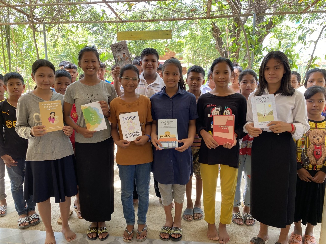 Children holding books