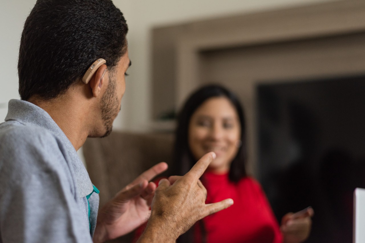 A Deaf person talking in sign language