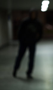 Man in background