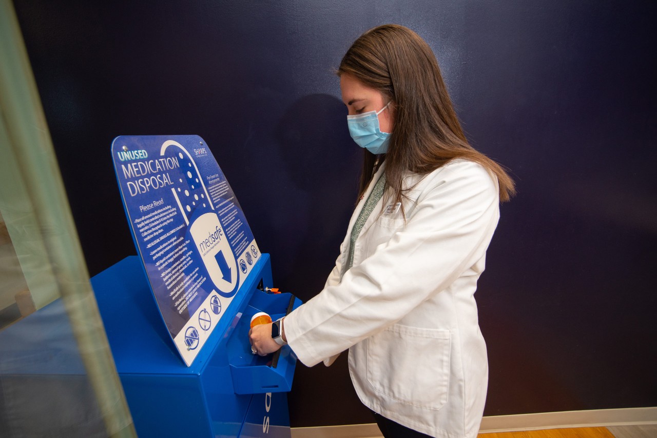 Pharmacy student at the drug take back program