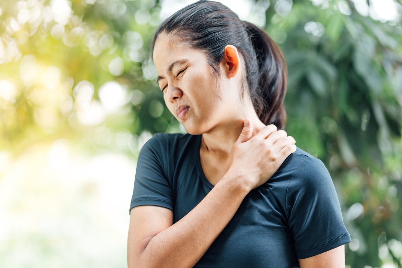 young asian woman with pain in shoulder , Ache in human body , o